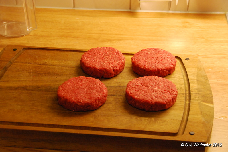 Burgers being prepared