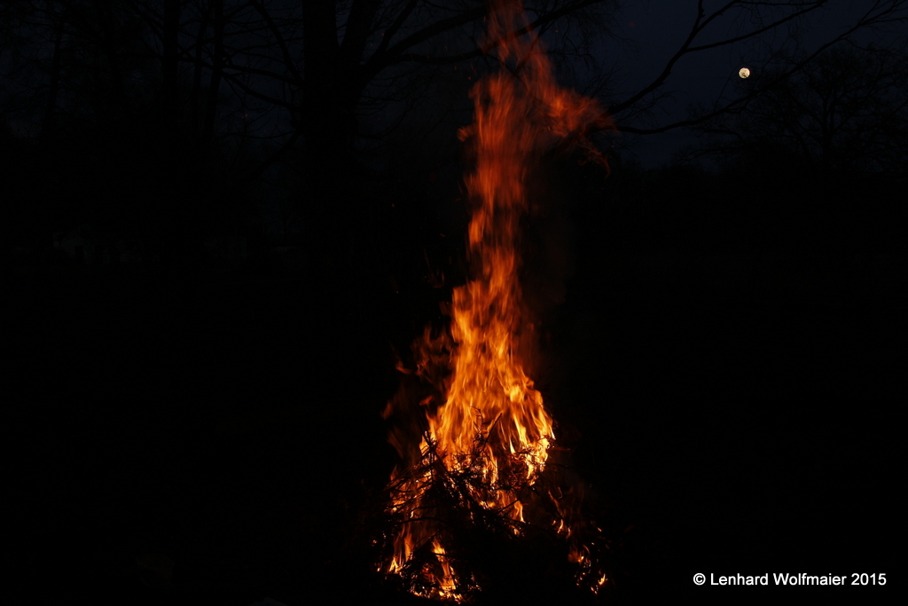 The fire in the night with moon